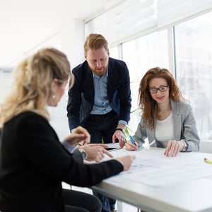 team-of-city-officials-looking-at-papers_blog