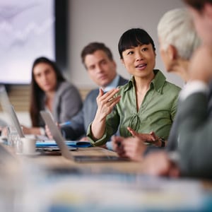asian-businesswoman-talking-to-colleagues-in-office_email