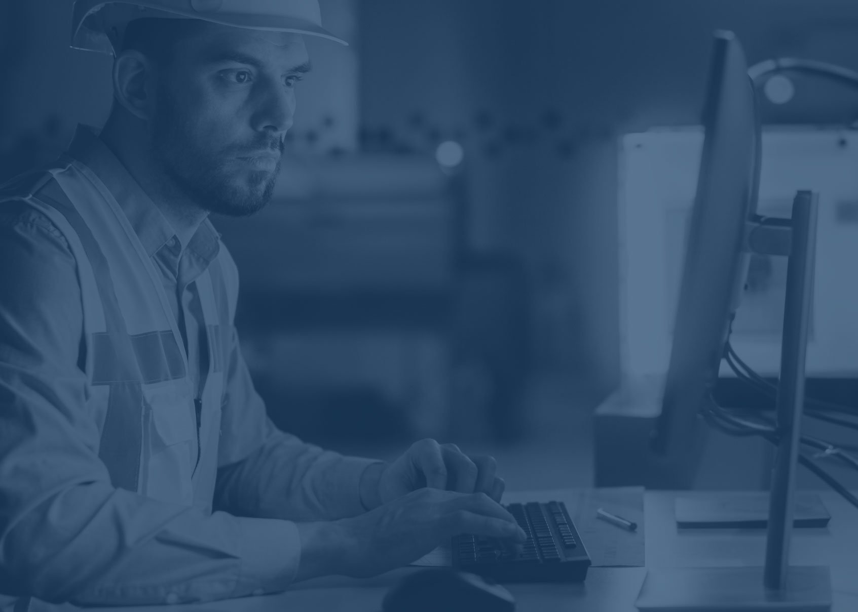 Building official working on laptop