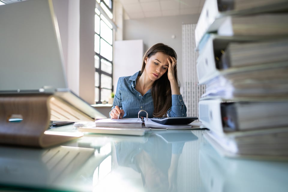 Stressed woman at desk