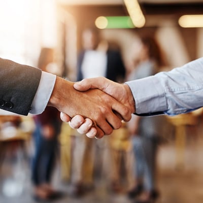 Officials shaking hands, closeup