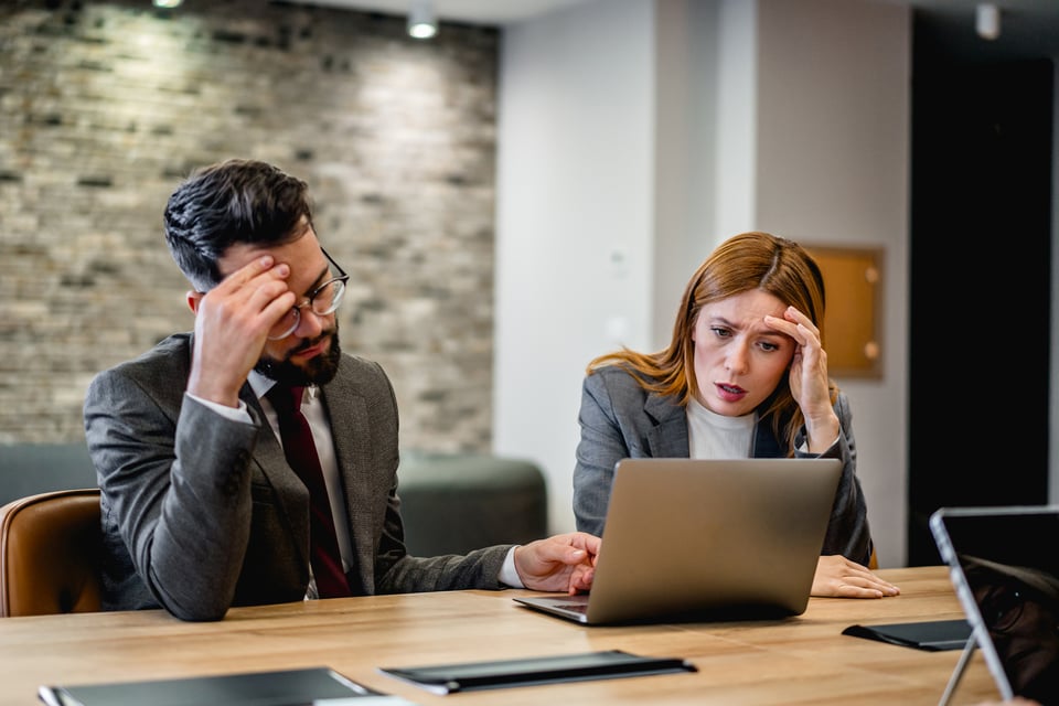 Frustrated municipal employees at the desk
