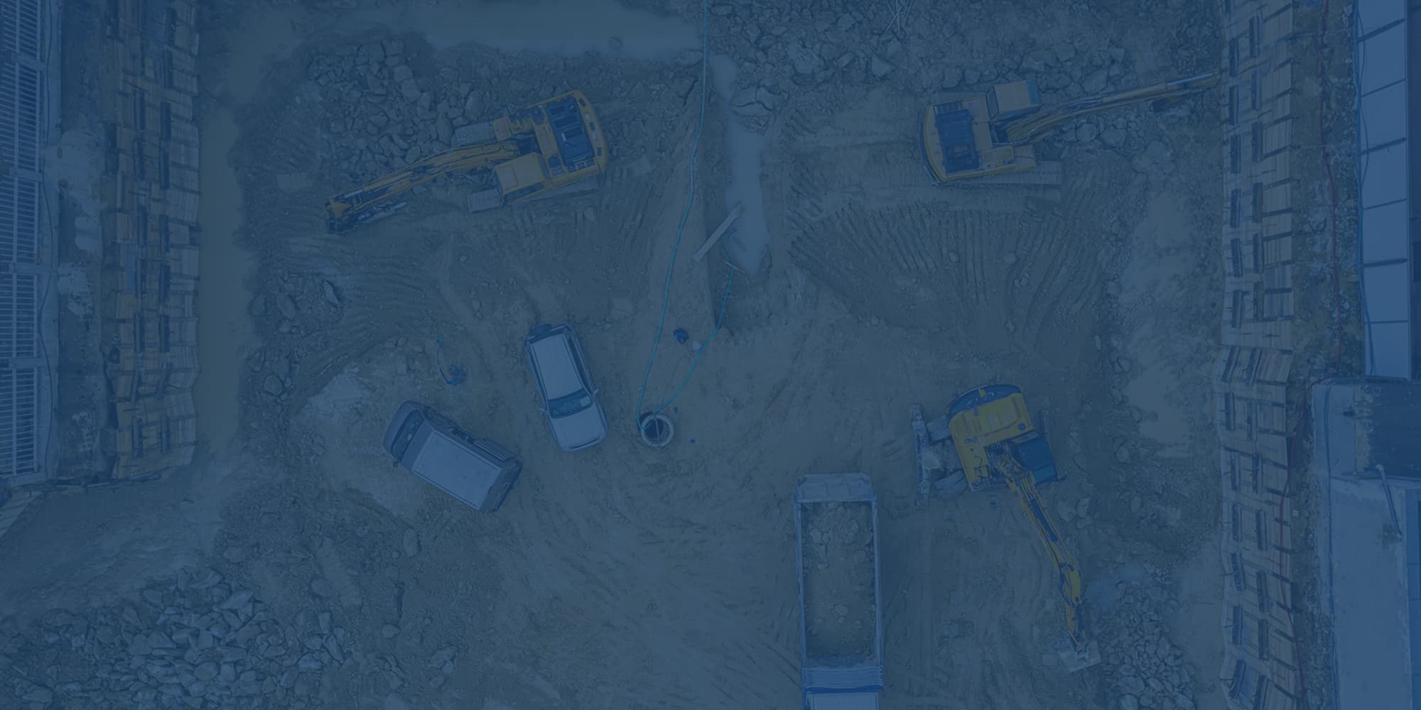 aerial-construction-overview-blue-overlay-heavy-equipment-1