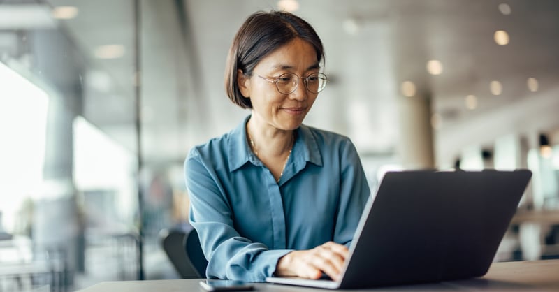 Woman working on permits at her desk