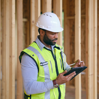 contractor-on-job-site-checking-permit-status