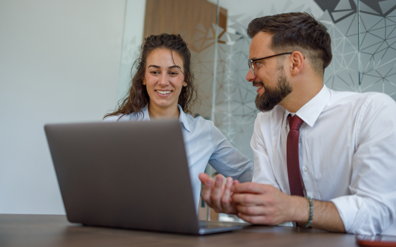Couple working at desk together
