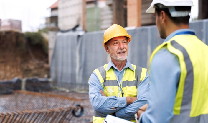 Construction workers having a conversation. 