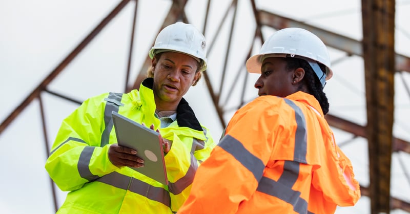 Permit technicians on job site