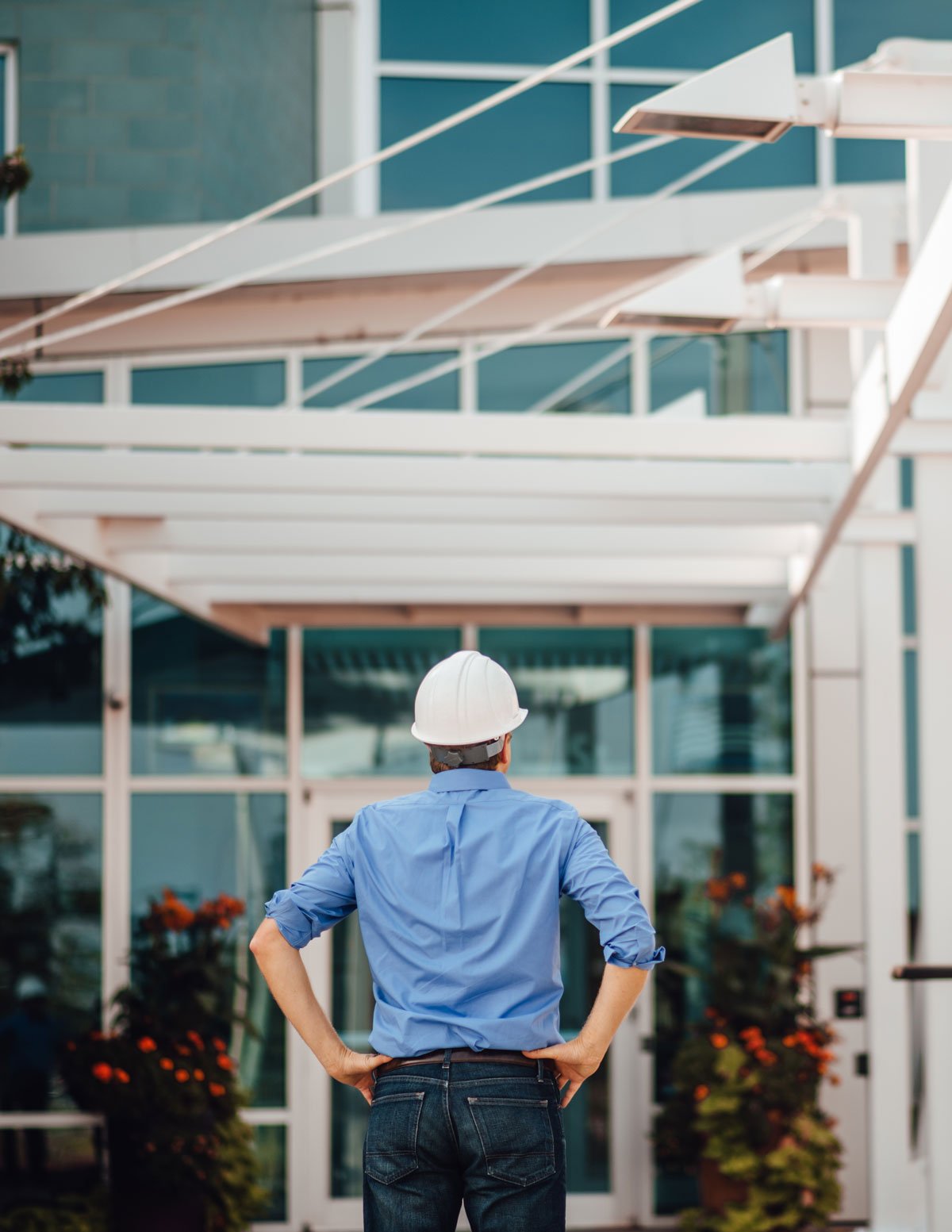 Builder observing building