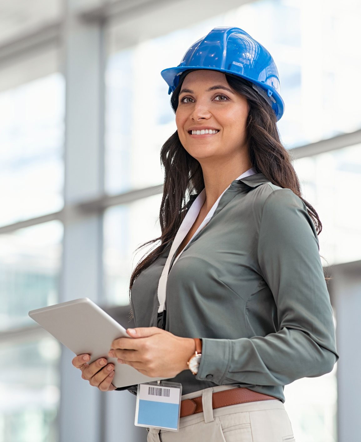 woman with tablet looking optimistic woman with tablet looking optimistic